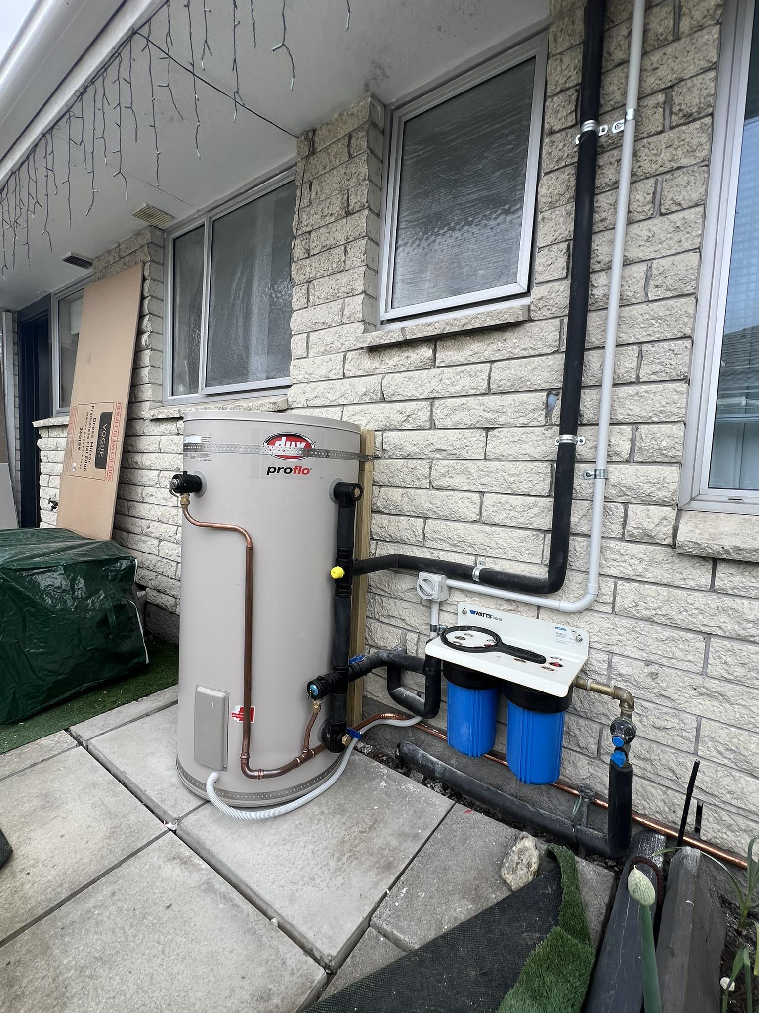 Dux Proflo outdoor cylinder paired with a twin-cartridge water filter system, Christchurch